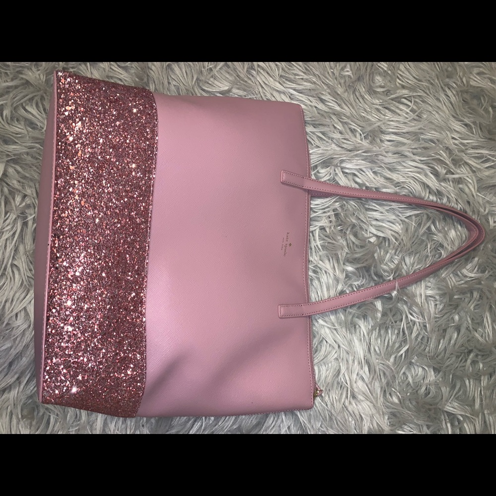 Name brand clothing, shoes, & pocketbook